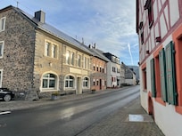 The road outside the house. Not a lot of traffic.