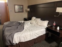 King bed, comfortable bedding. Pardon the unmade bed