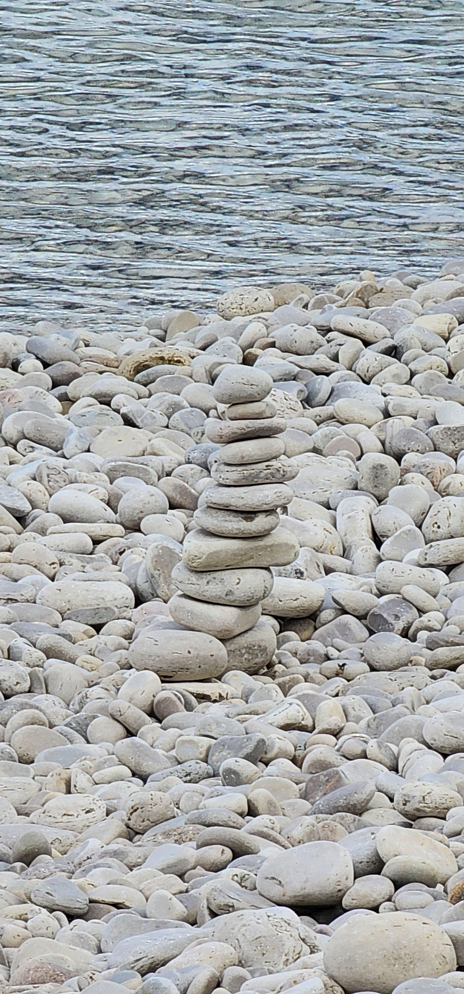 Rocky beach at property