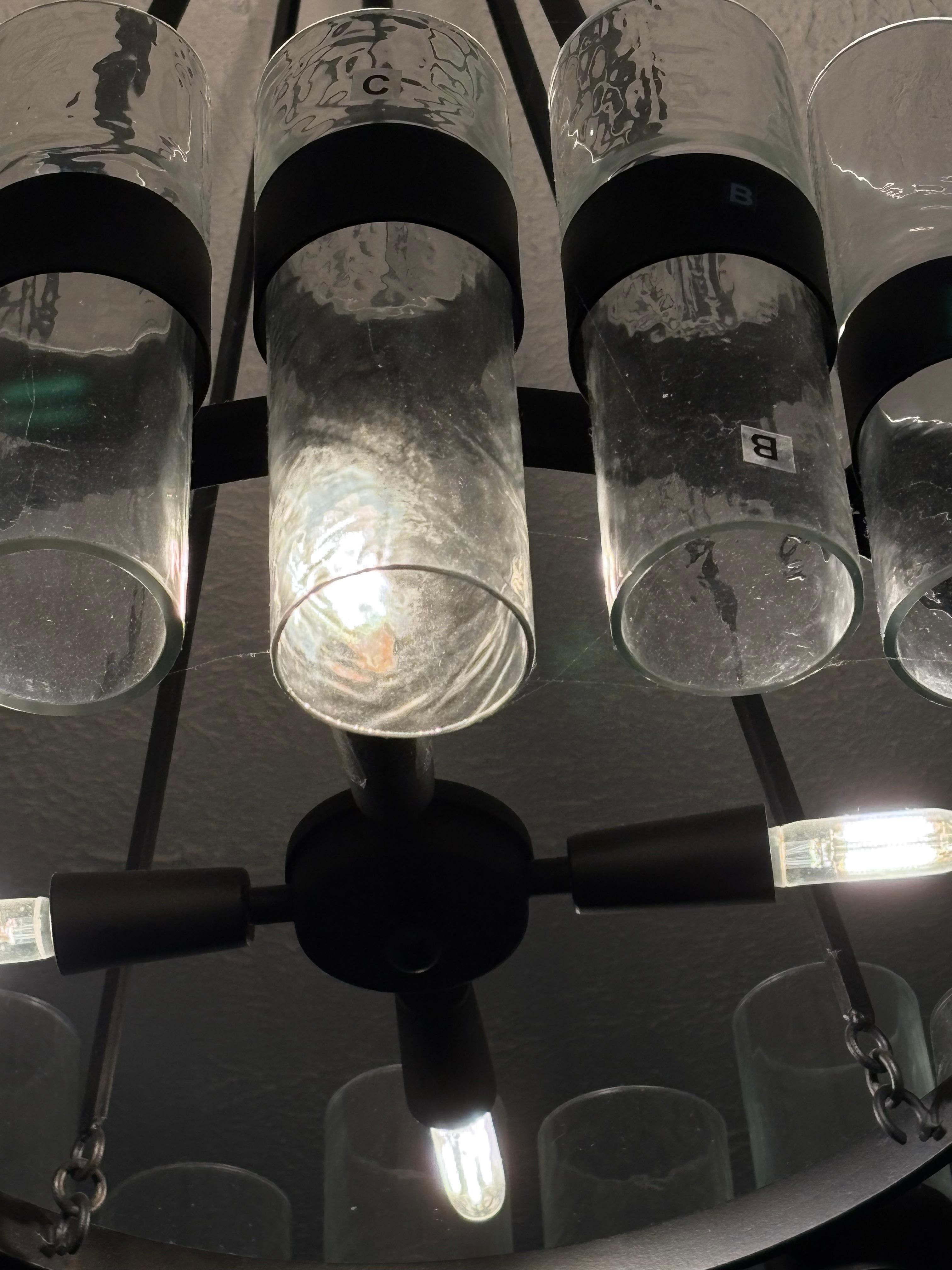spiderwebs on the chandelier above the dinning table
