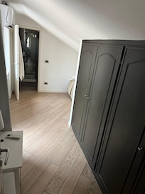 Third living space where cot was placed for 6th person