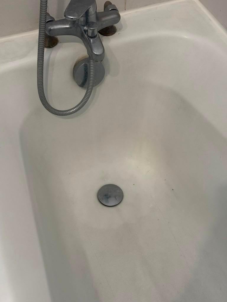 Tired bath/faucet. Not draining well