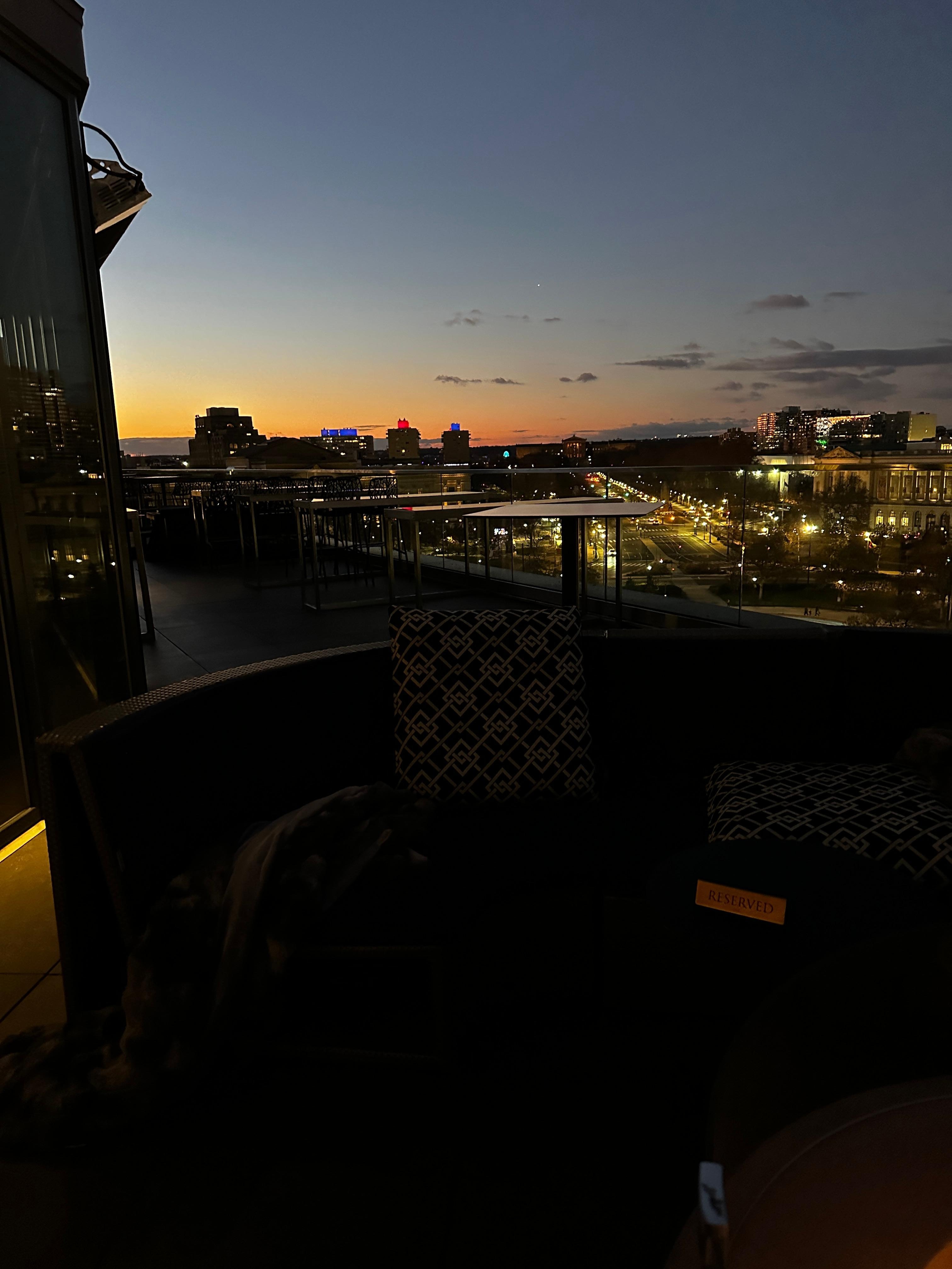 Rooftop outdoor seating and bar.