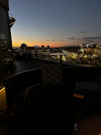 Rooftop outdoor seating and bar.