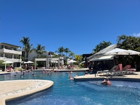 Pool with swim up bar