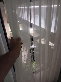 le rideau de la porte fenêtre !!