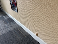 wall paper a tear we informed front desk