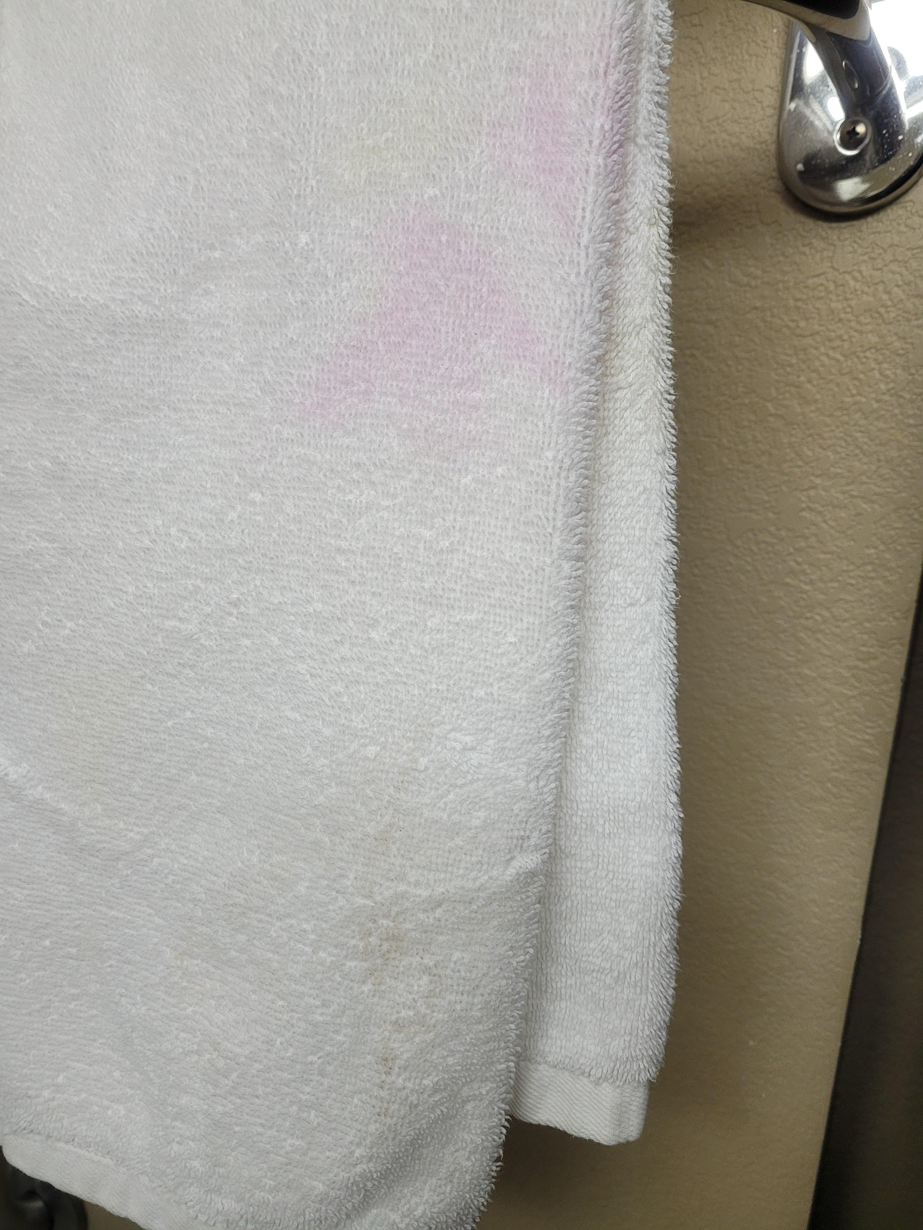 Towels hanging in the bathroom 