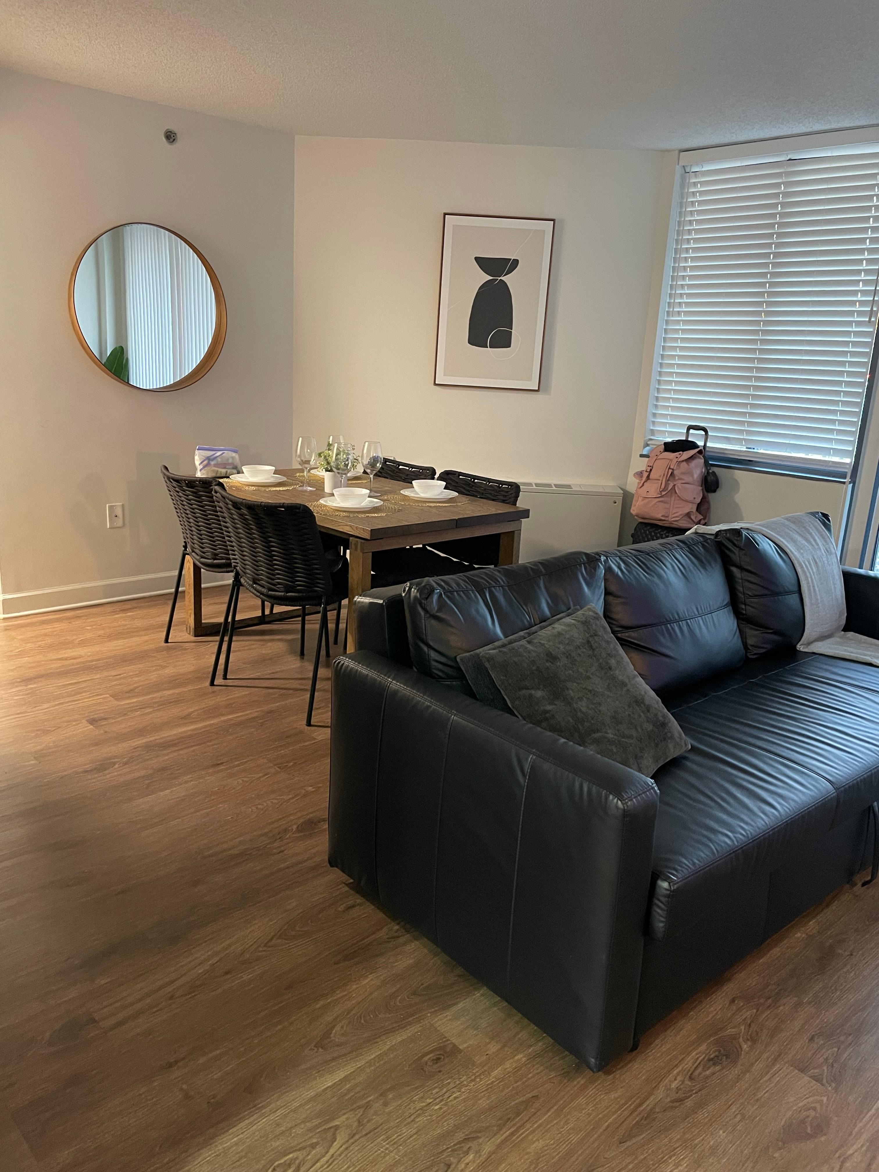 The living and dining area was spacious. The sofa pulled out into a a full-size sleeper with extra bedding stored in the storage underneath the sofa