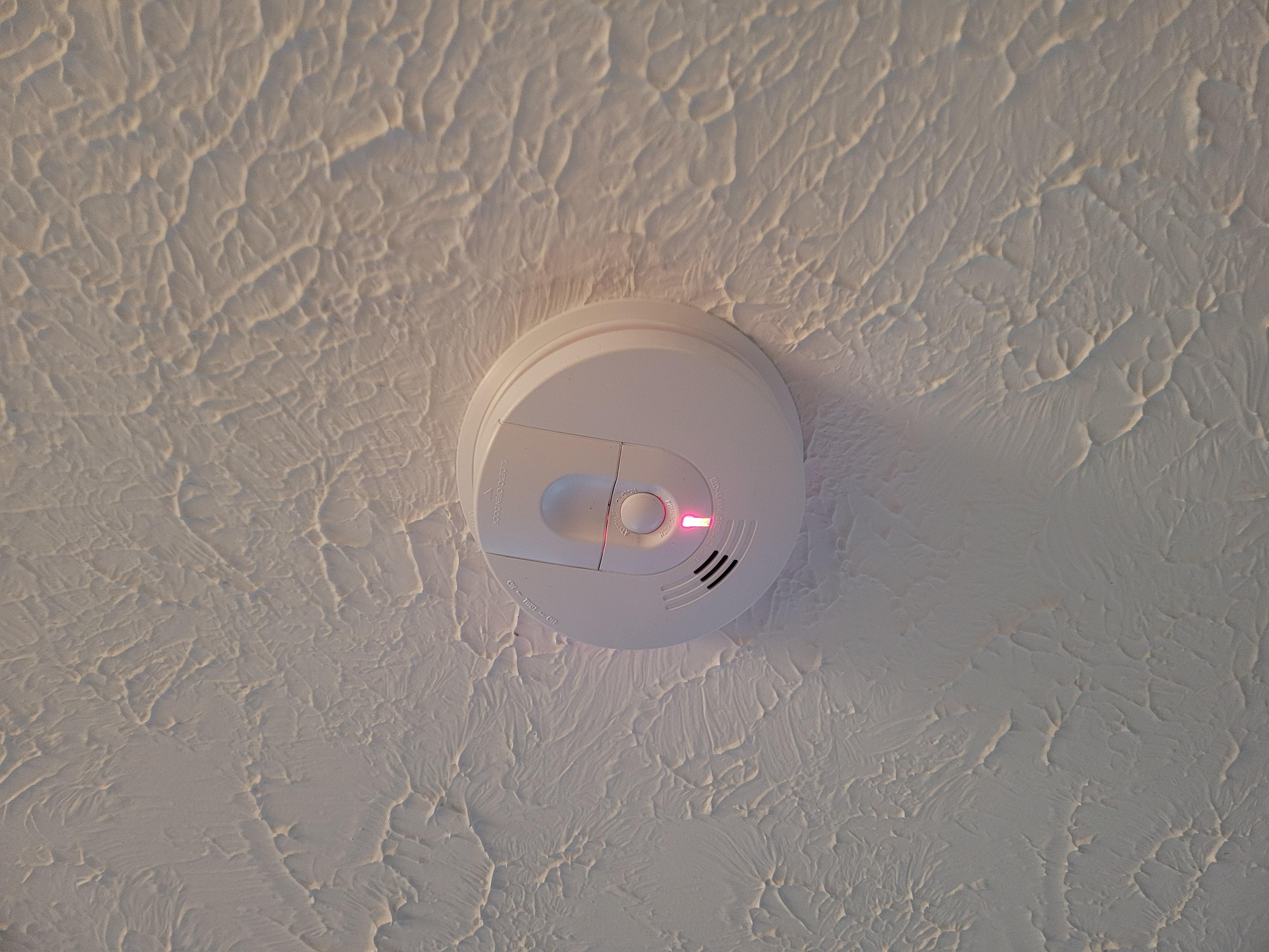 One close up flashing green and red light. 