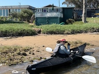 Gloria returning from a paddle