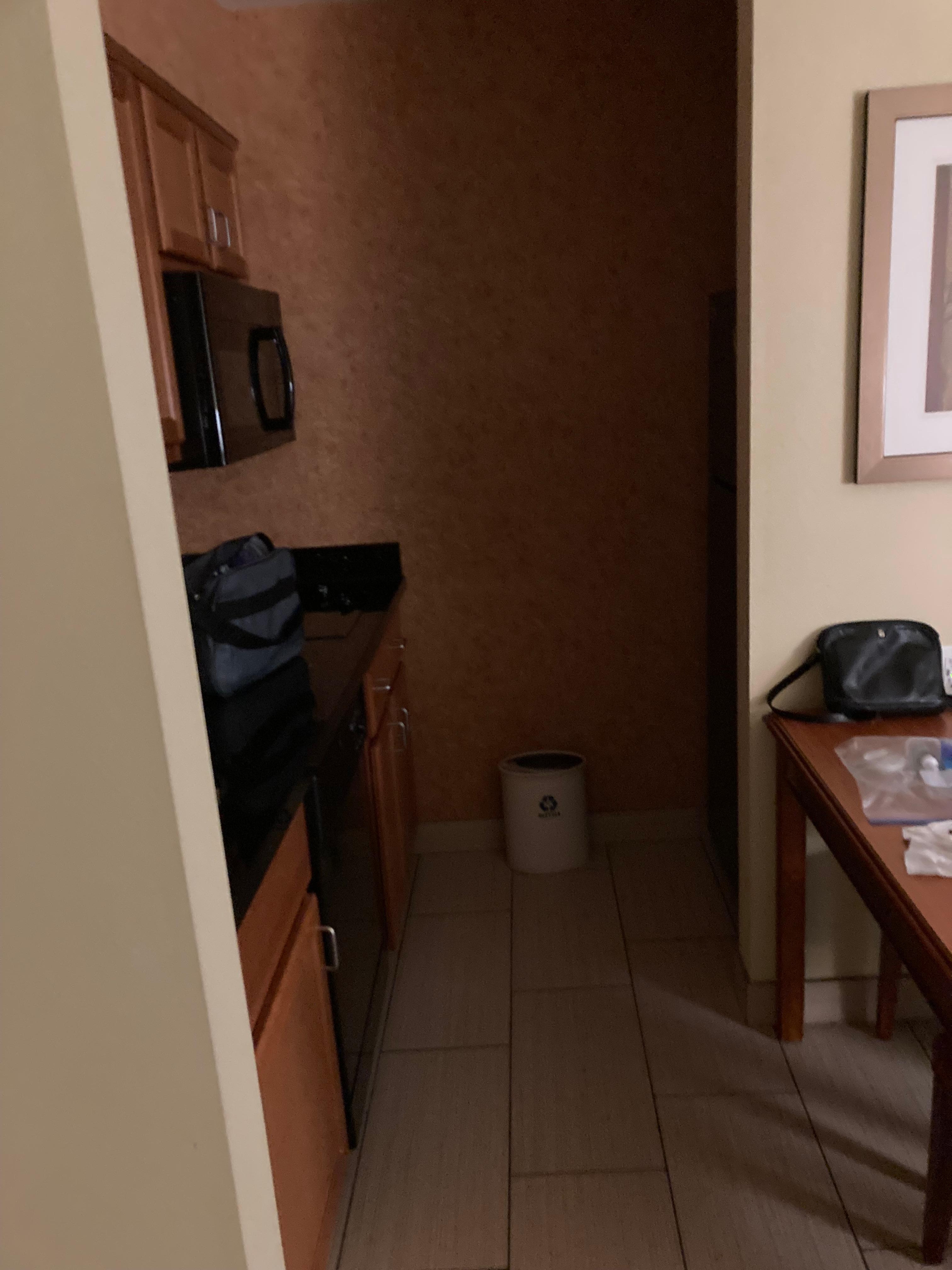 Kitchen: full refrigerator, stove top, coffee maker, microwave, dishwasher, garbage disposal and kitchen table. 
