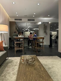 Lobby bar. One complementary drink per night.
