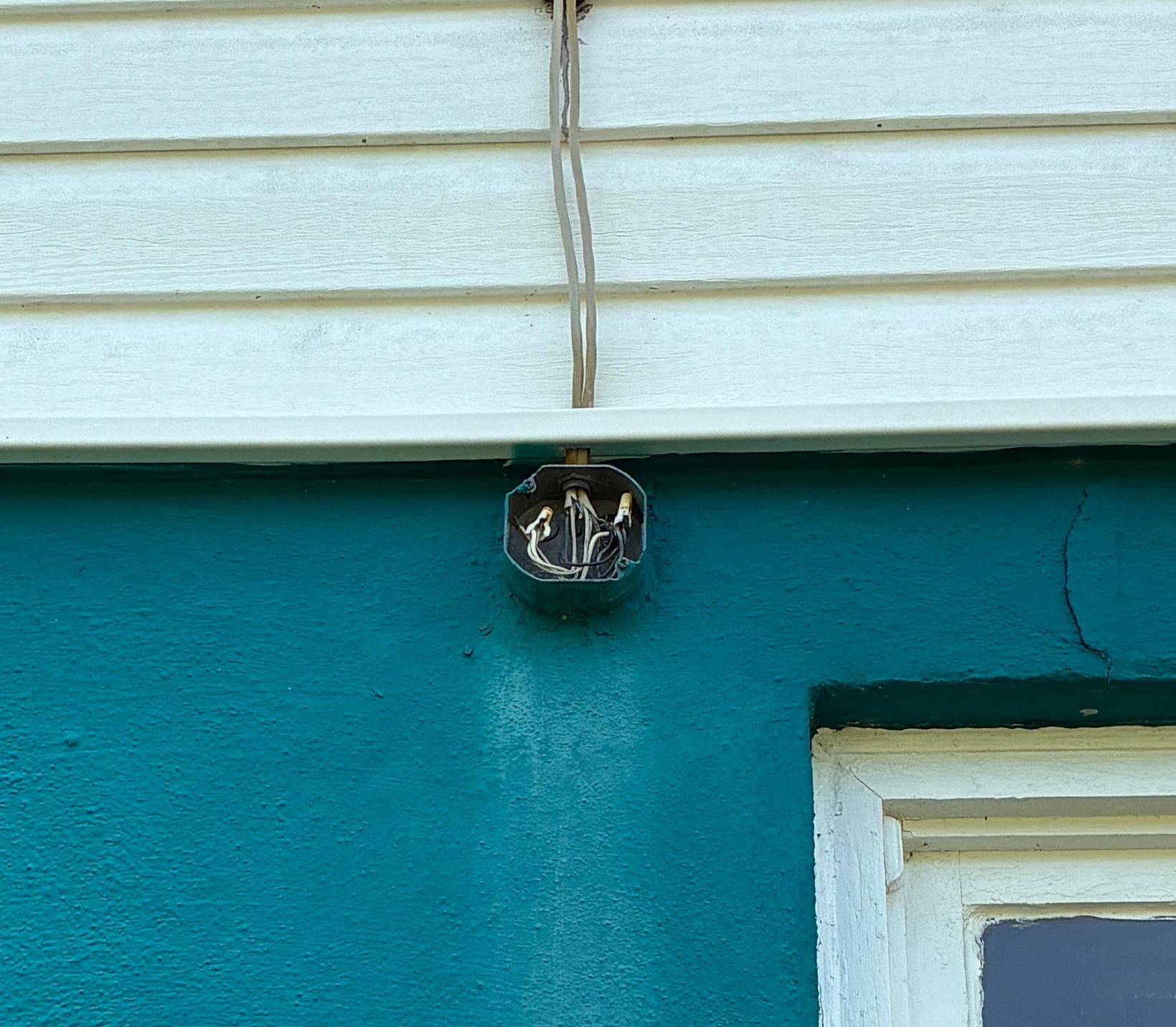 Exposed outdoor junction box