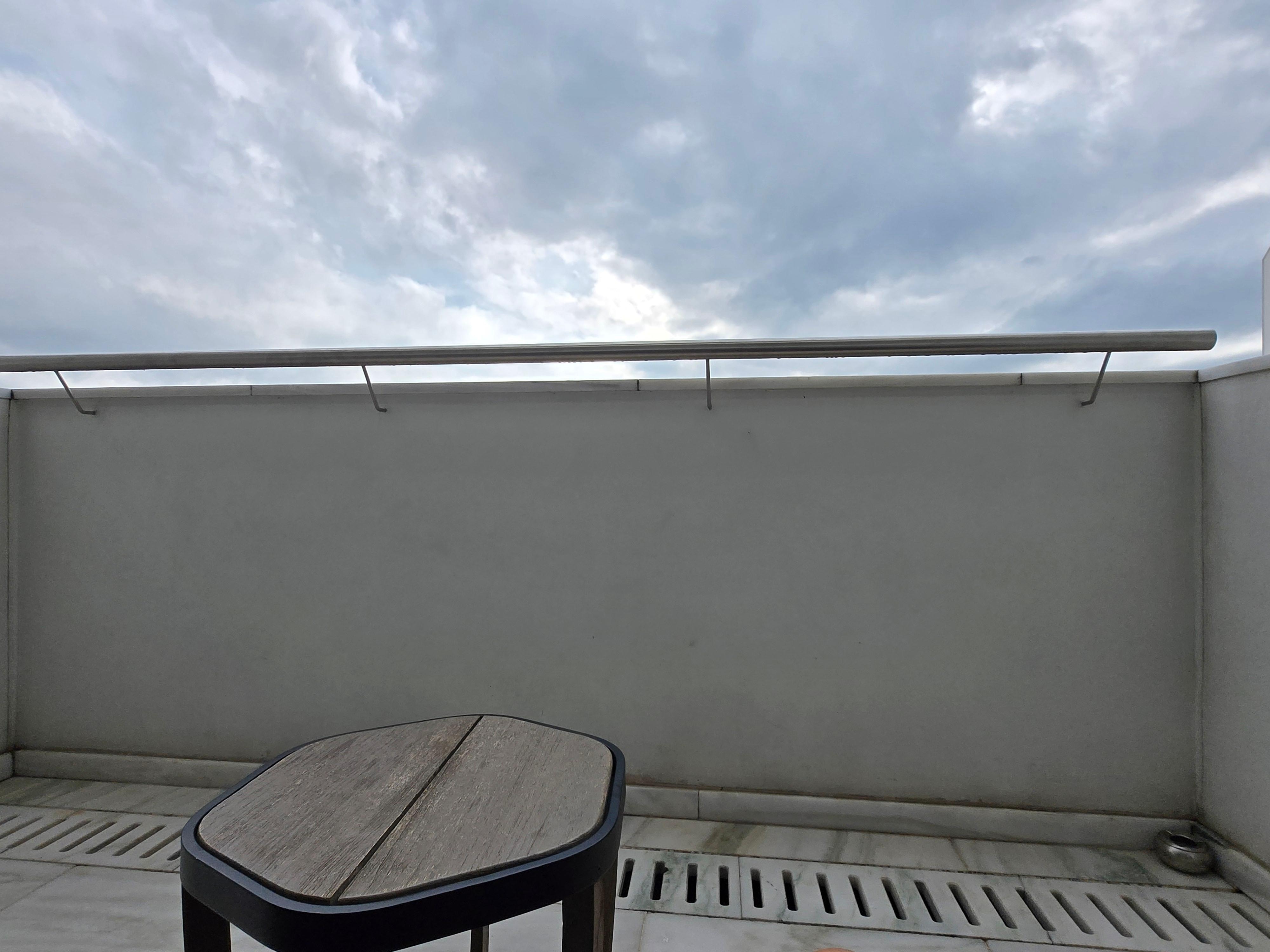 view sitting on the furniture on the balcony