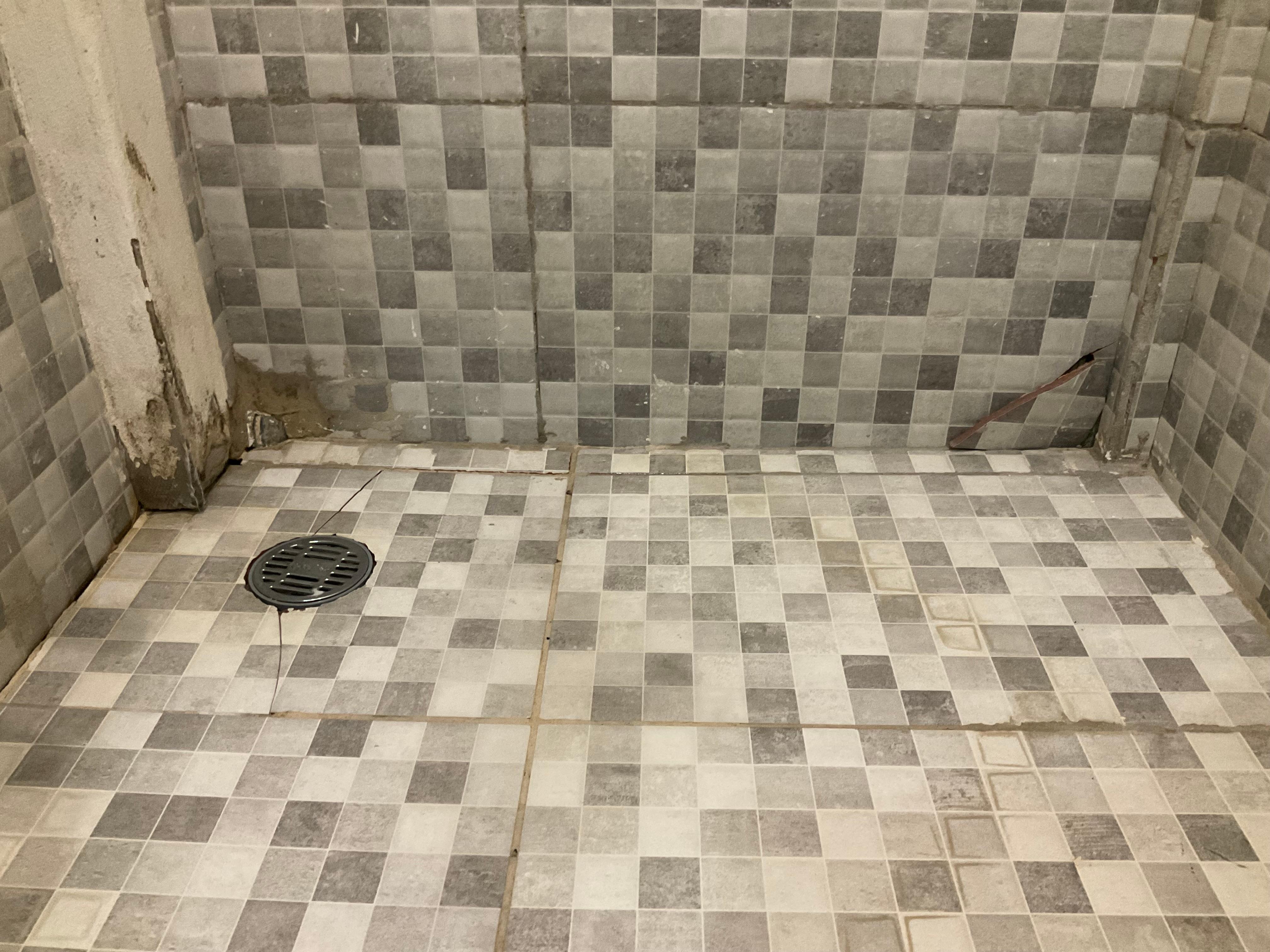 Broken tiles in shower
