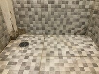 Broken tiles in shower