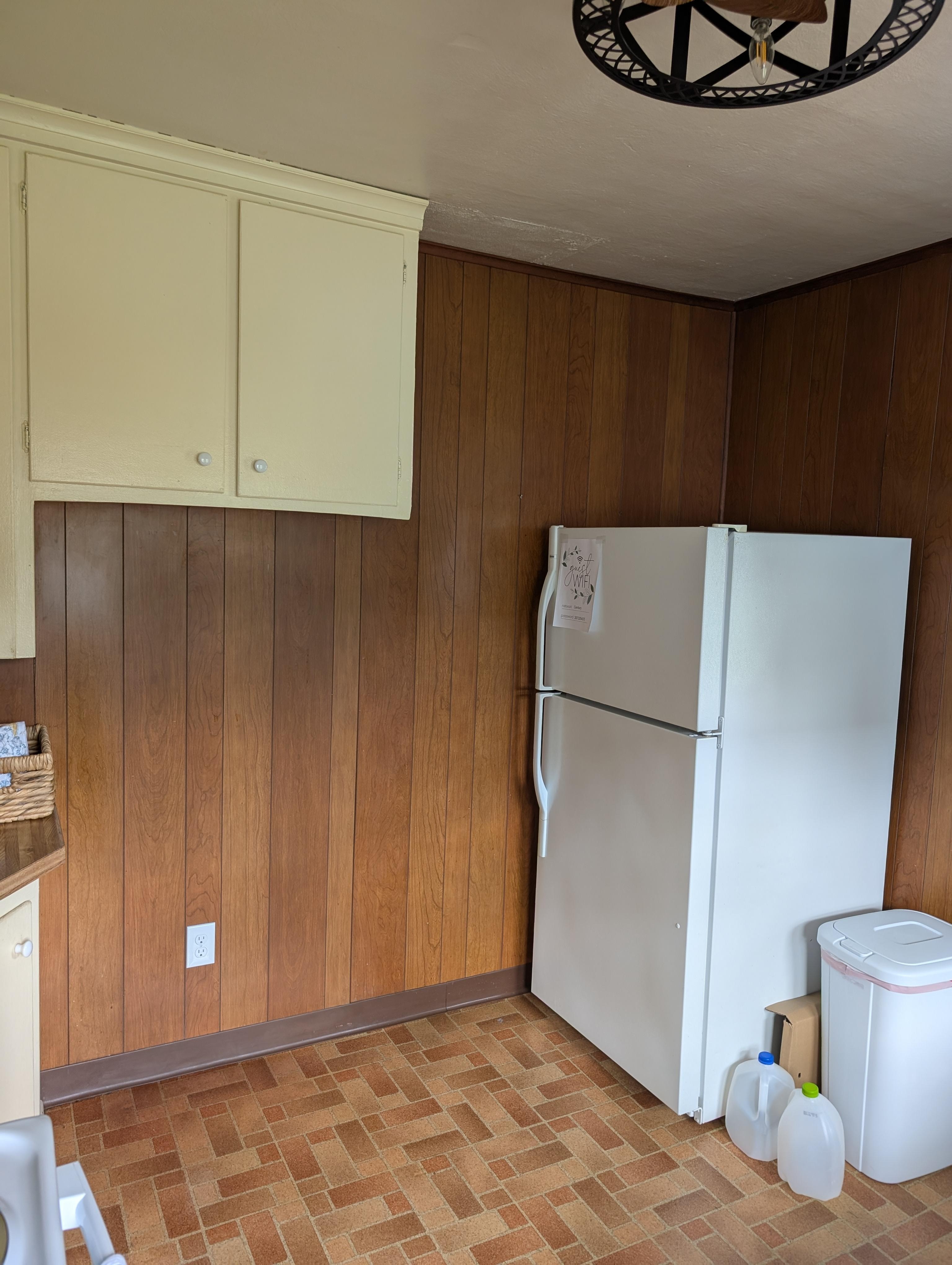 Due to my carelessness,I hit my head on cupboard.
You just have to be careful when opening the refrigerator.