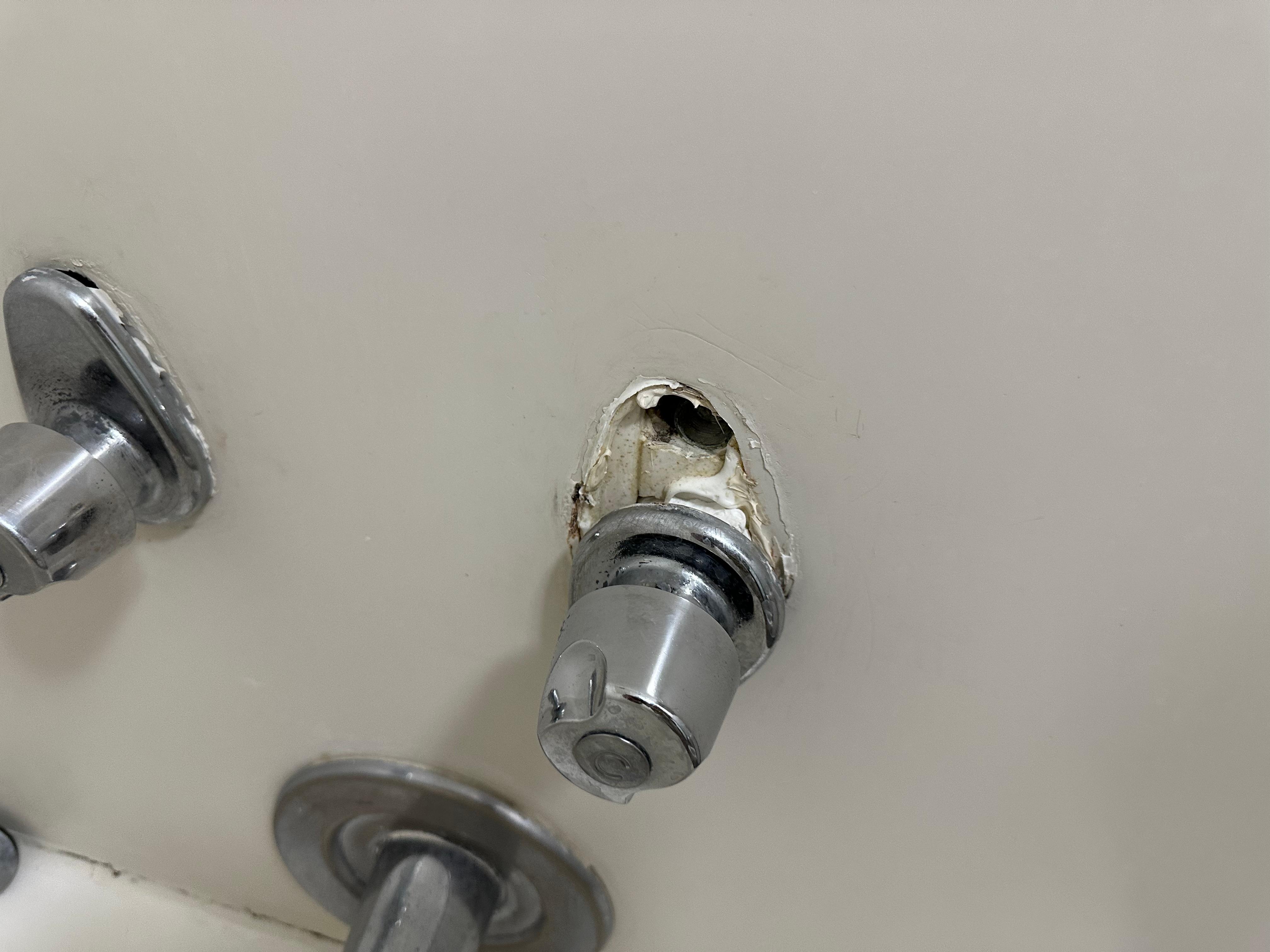 Tub handle falling off. I had to hold it in to turn it on. 