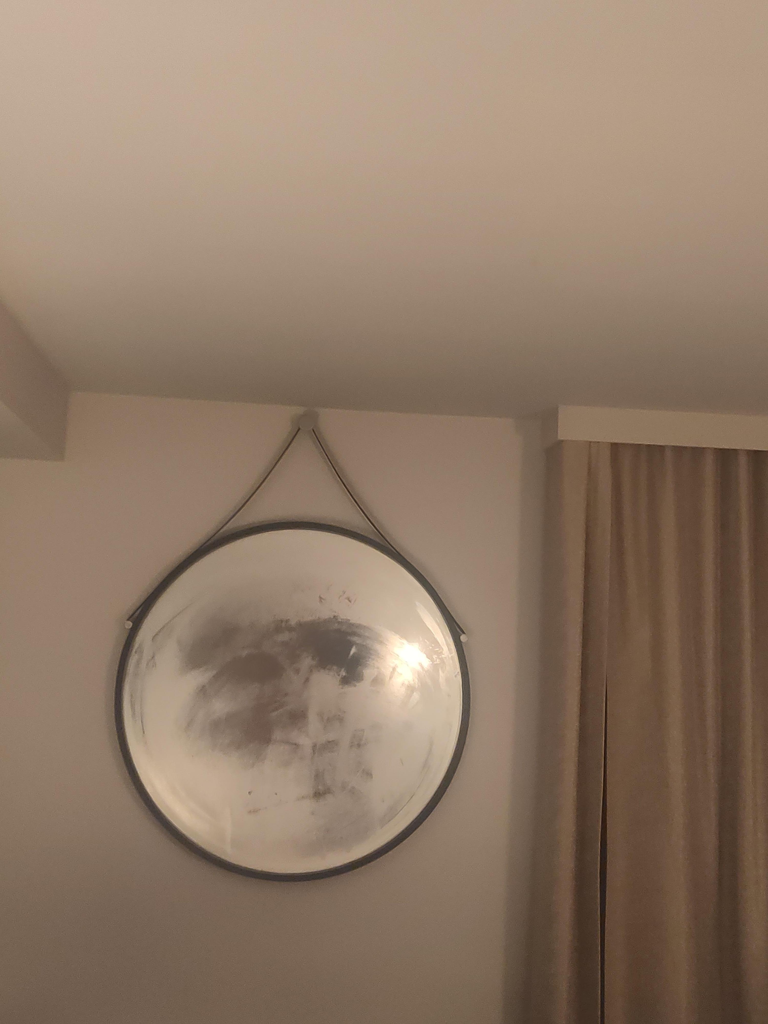 Mirror by bed when someone showers because the fan didn't turn on.