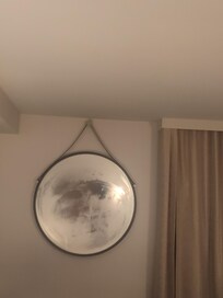 Mirror by bed when someone showers because the fan didn't turn on.