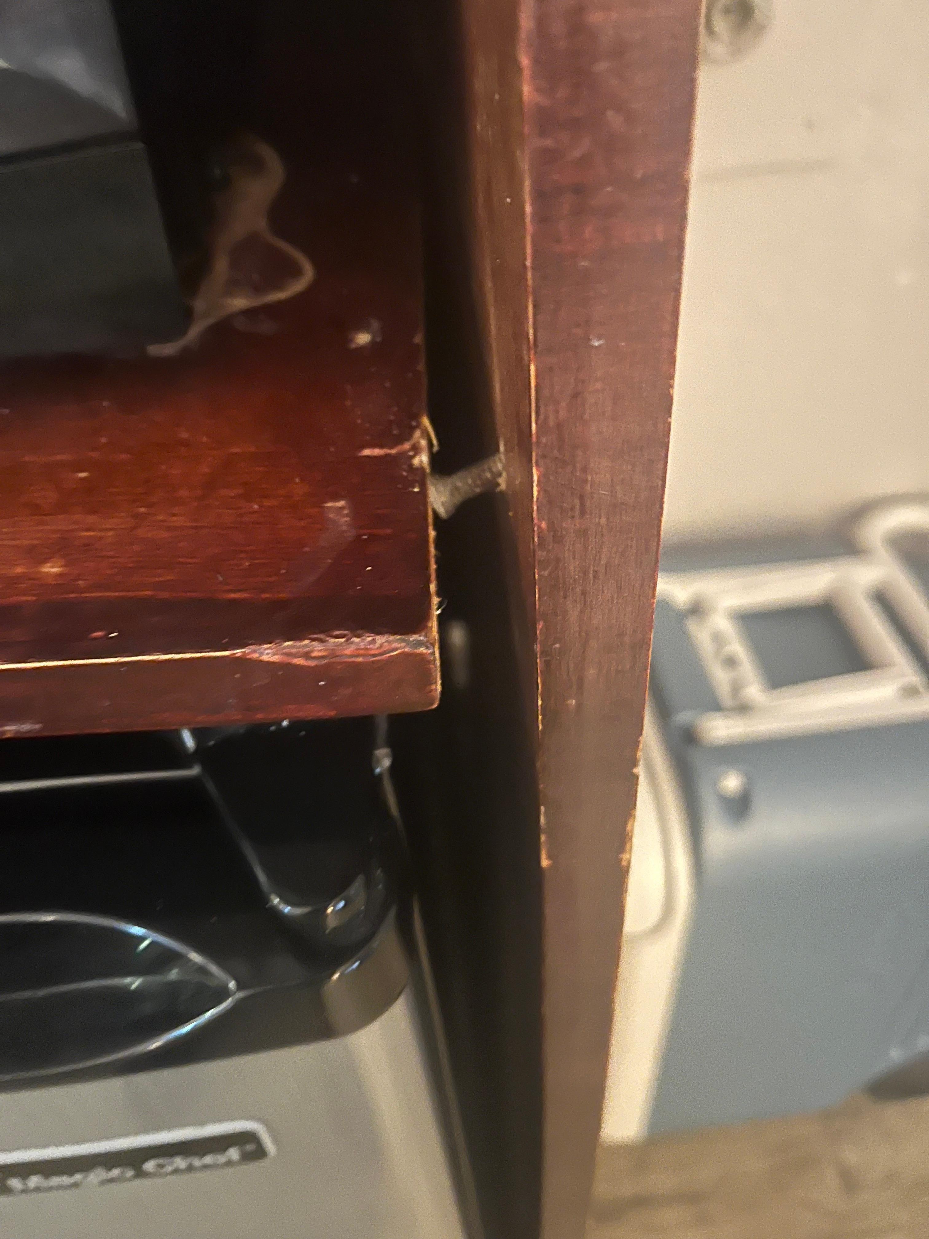 Microwave cabinet, had to rig it up to be level with an empty soda can. 