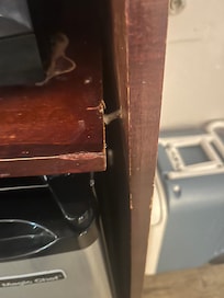 Microwave cabinet, had to rig it up to be level with an empty soda can.