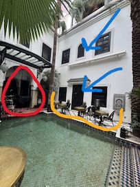 The red mark is the band area. The blue arrows were our rooms. The yellow shows seating right outside the door. The room names are Sultan and Caliph.