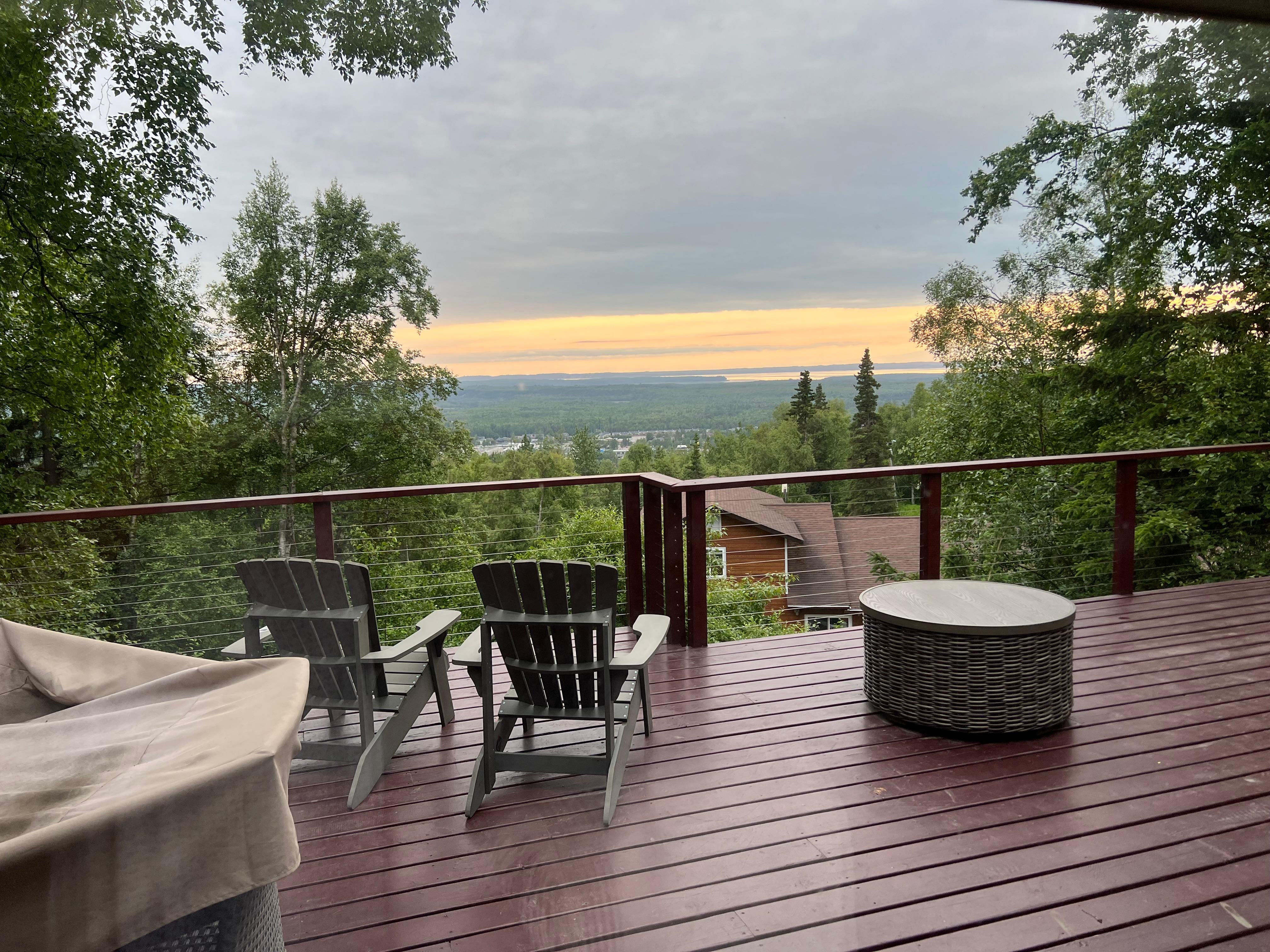 Spectacular view from the deck. We loved relaxing here. We cooked steaks on the grill and enjoyed dinner on the beautiful fire pit table. 