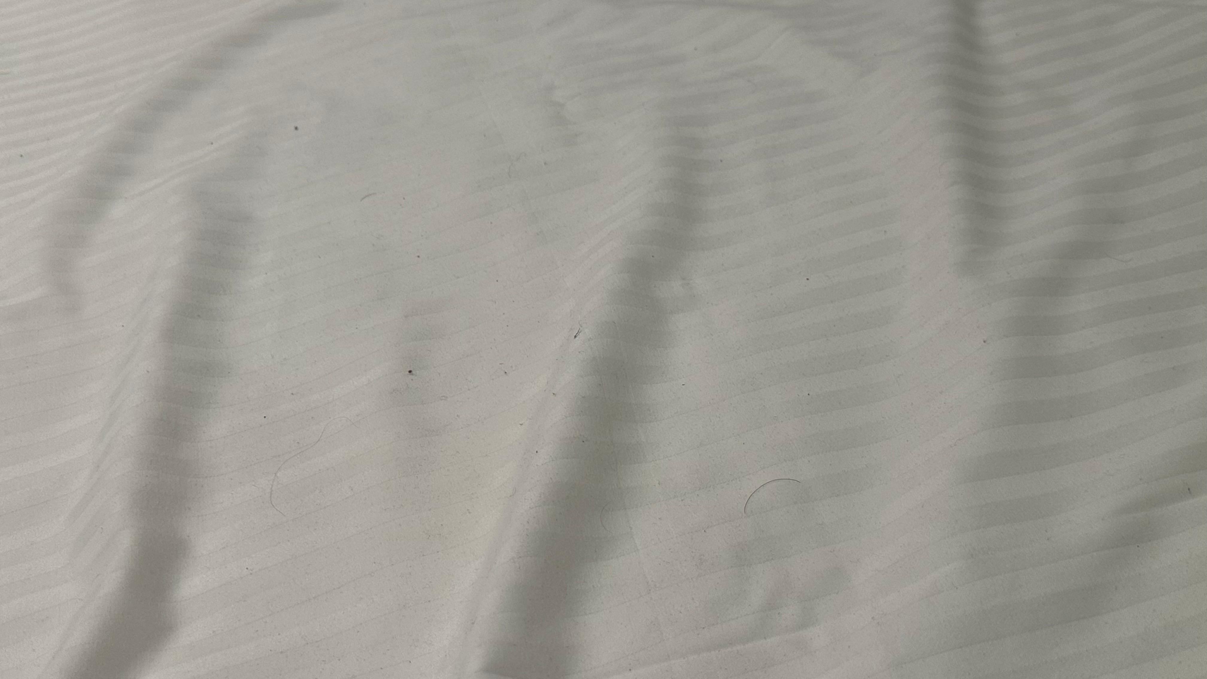 The sheets under the decorative cover