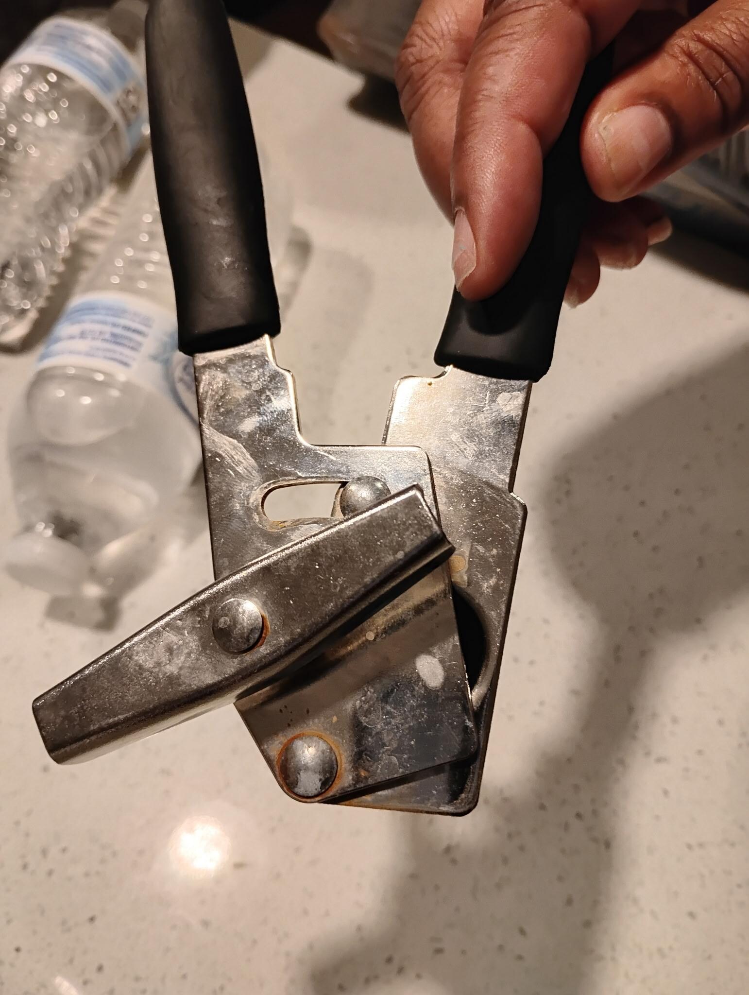 Another view of rusted can opener 