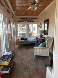 A bonus room with a bed for lounging or sleeping. Great view of the water and beautifully decorated. It was my favorite place.