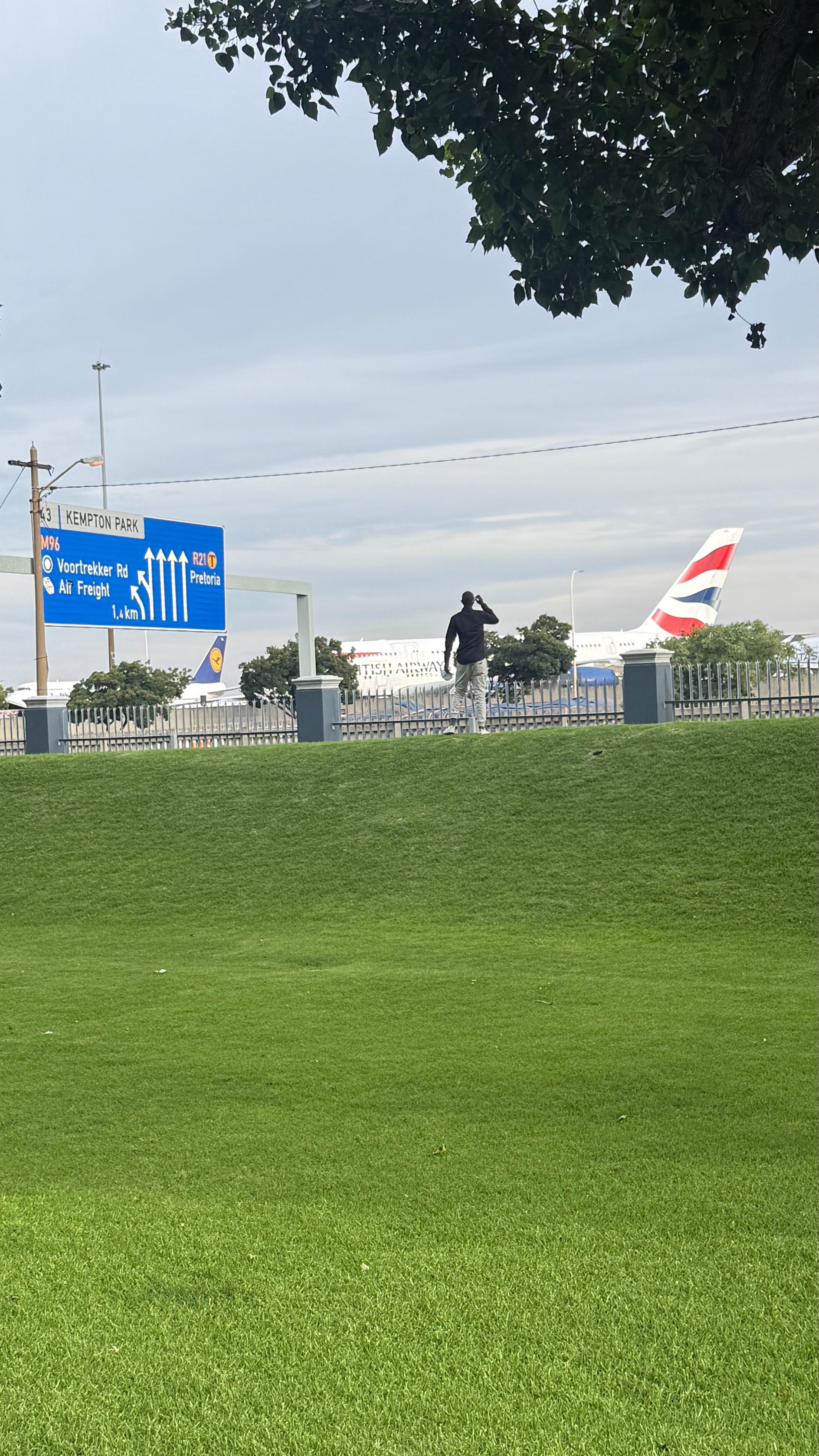 Watching the planes at the International terminal 