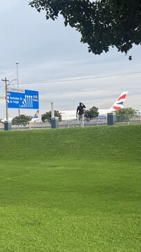 Watching the planes at the International terminal
