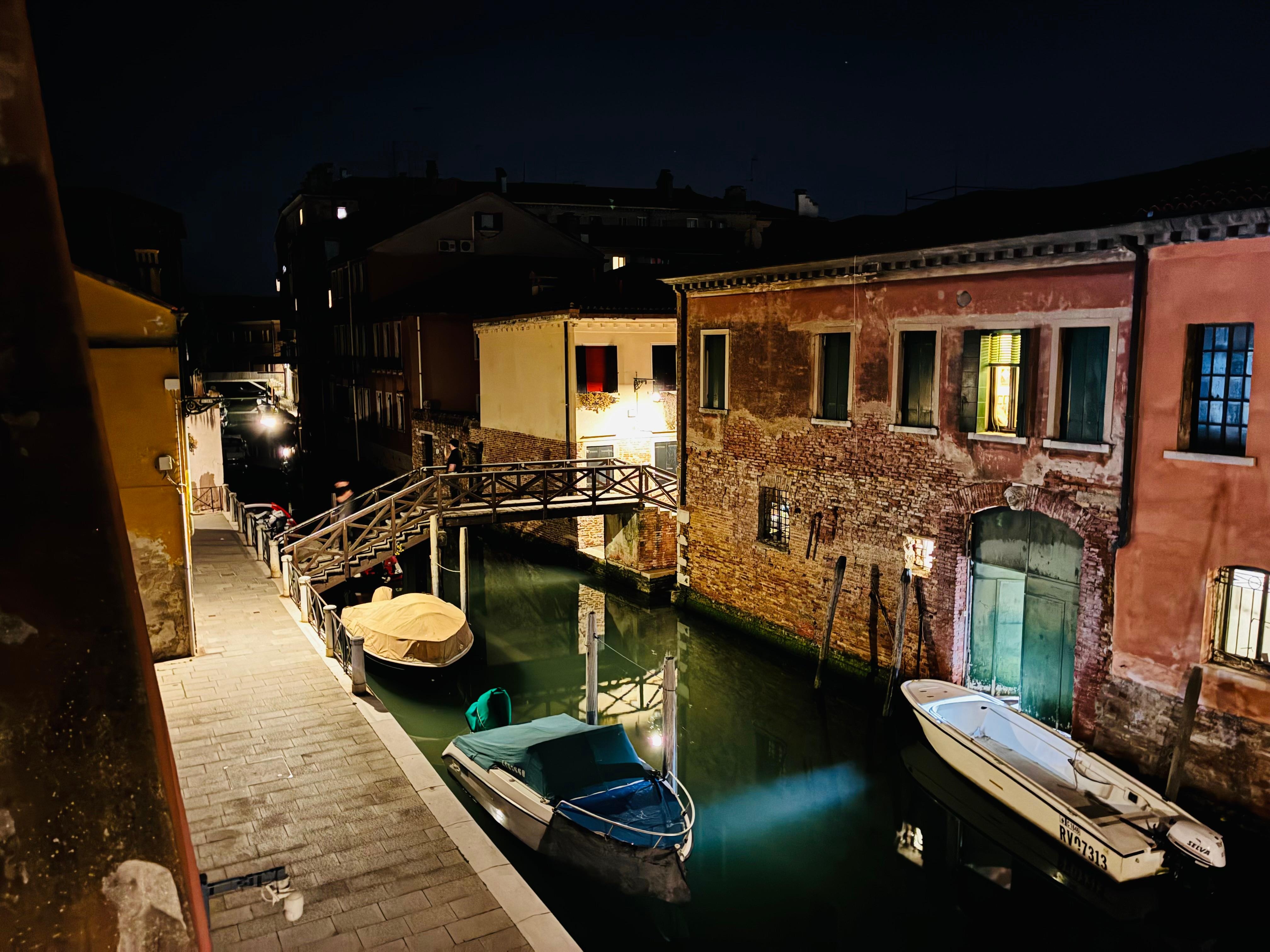 Nighttime view of the quiet canal from Nati’s House balcony 