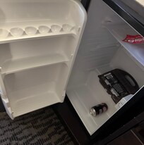 the refrigerator’s shelving and freezer door were ripped out as was the door shelving.