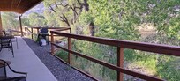 Back door showing grill and creek