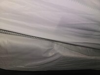 Glass wedged between mattress and box spring
