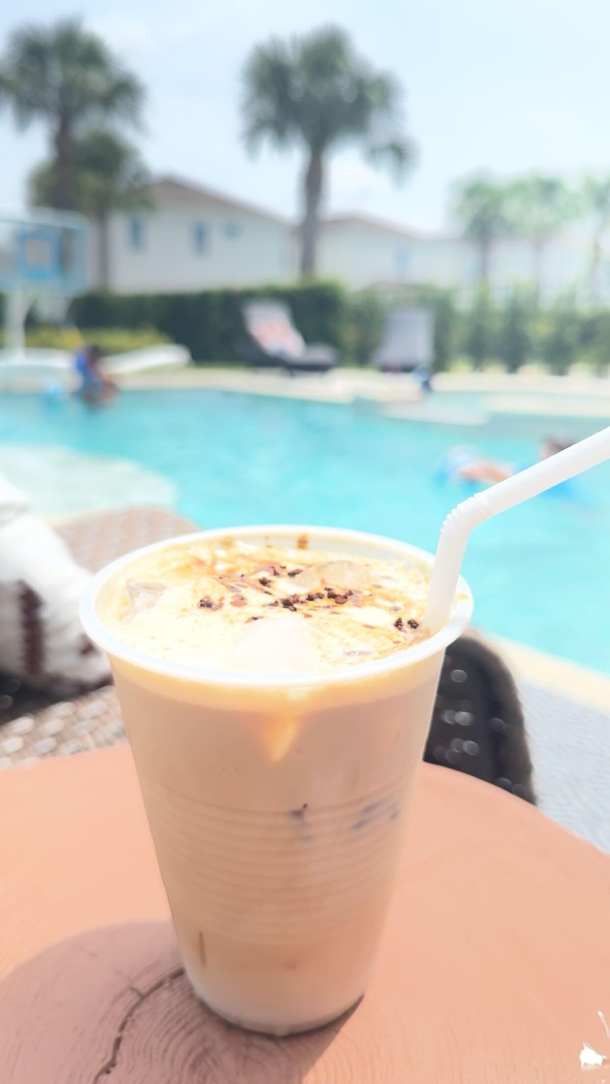 Iced coffee by the beautiful pool. 