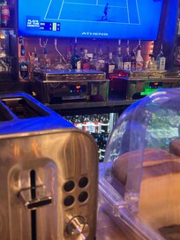 The “breakfast voucher” gets you stale hashbrowns, eggs, and bacon with coffee served in their bar.