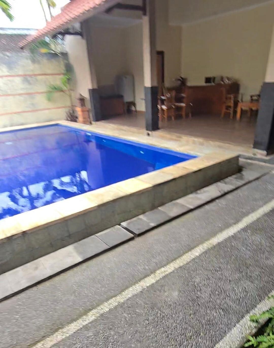 Our private pool with huge outside seating and kitchen area