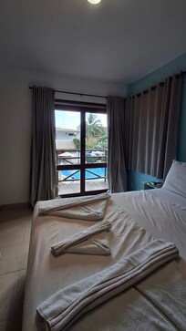 Quarto superior com sacada