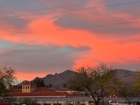 Another sunset view from rooftop seating area.