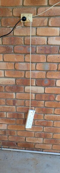 This was just hanging down and available for a toddler to grab hold of it. It was turned on at the top switch.