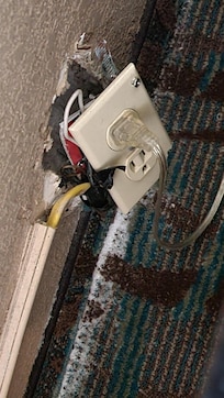 Didn't notice at first as it's behind a nightstand, but did report to front desk.