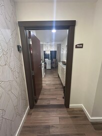 Main unit entrance off private foyer.