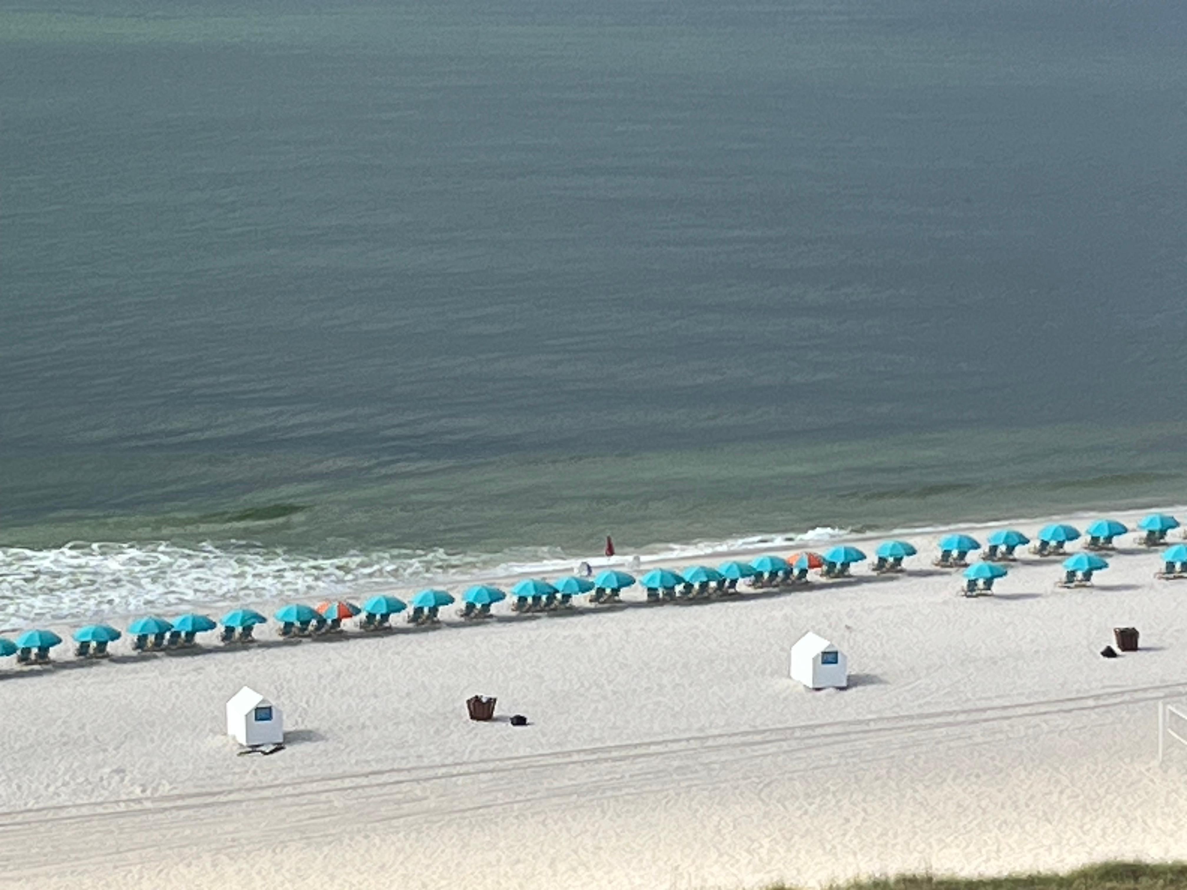 Beach views of umbrellas you can see from balcony 