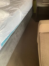 The broken bed on the floor.!!