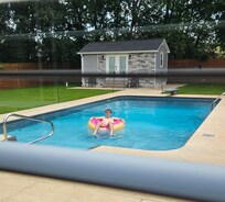 Cute pool toys, floats and beach towels available at property.