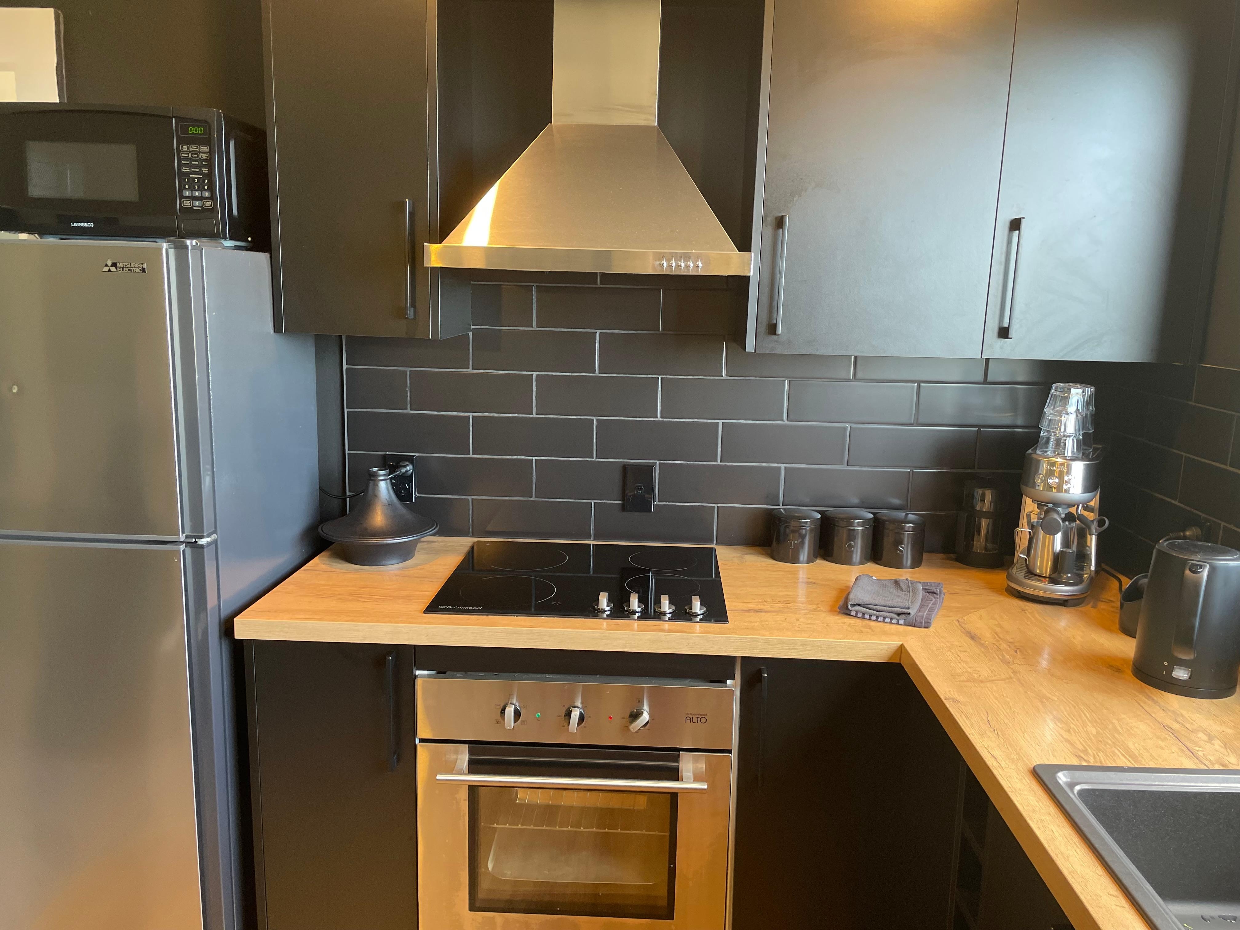 Modern, clean kitchen with everything you could need.